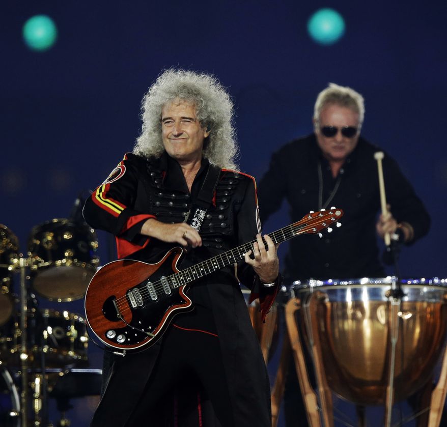 Brian May performs during the Closing Ceremony at the 2012 Summer Olympics, Sunday, Aug. 12, 2012, in London. (AP Photo/Charlie Riedel)