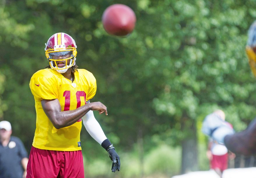Redskins QB Robert Griffin III ran 14 plays with the first-string offense in the preseason opener at Buffalo on Thursday night. Washington won 7-6, highlighted by a Pierre Garcon touchdown. (Rod Lamkey Jr./The Washington Times)