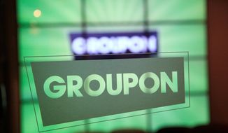 Groupon said Monday that its second-quarter earnings beat Wall Street’s profit estimates, but underwhelmed analysts and disappointed investors with growth hurt by unfavorable currency movements. (Associated Press)