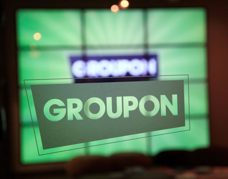 Groupon said Monday that its second-quarter earnings beat Wall Street’s profit estimates, but underwhelmed analysts and disappointed investors with growth hurt by unfavorable currency movements. (Associated Press)