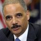 **FILE** Attorney General Eric H. Holder Jr. speaks July 26, 2012, in the Cabinet Room of the White House in Washington. (Associated Press)