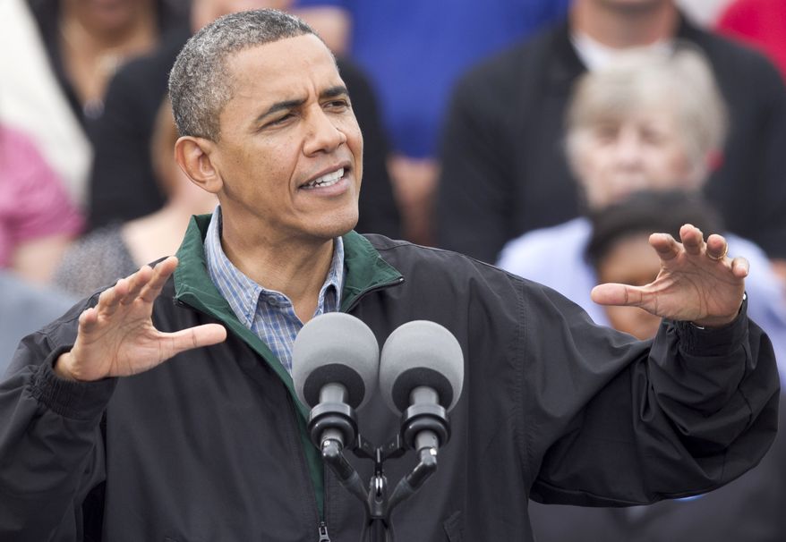 ** FILE ** President Obama speaks Aug. 13, 2012, during a campaign stop in Council Bluffs, Iowa. (Associated Press)