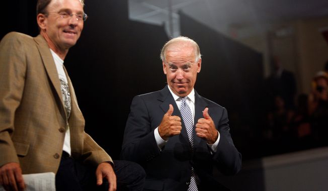 Vice President Joe Biden gives two thumbs up Monday, Aug. 13, 2012, during a rally at the Durham Armory in Durham, N.C. (AP Photo/The News &amp; Observer, Travis Long) 
