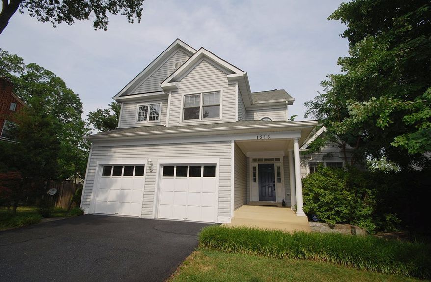 The home at 1213 Vernon St. N. in Arlington is on the market for $1,199,000. Built in 1998, the Colonial-style home has four bedrooms and four full baths over three finished levels.