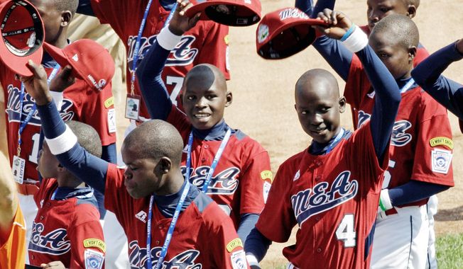 The Little League players from Lugazi, Uganda, are used to overcoming tough challenges, but face an uphill battle against 15 other teams. Their first-round game is against Panama. (Associated Press)