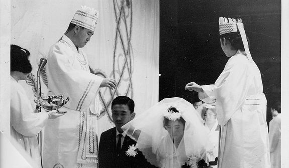 The Rev. Sun Myung Moon with his wife Hak Ja Han Moon conduct marriage blessing ceremony. Courtesy H.S.A.-U.W.C.