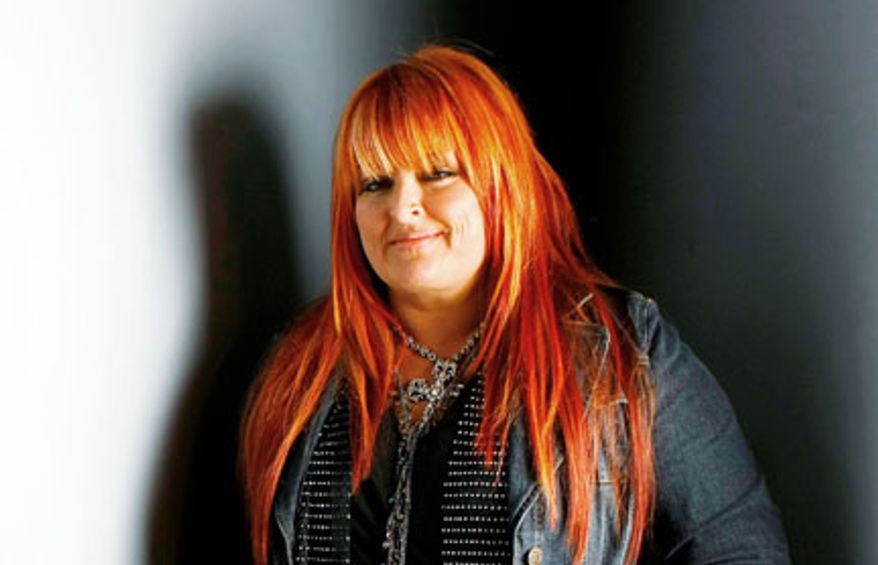 Country singer Wynonna Judd poses for a portrait at the Gibson Guitar Lounge during the Sundance Film Festival in Park City, Utah, in January 2009. (AP Photo/Mark Mainz)