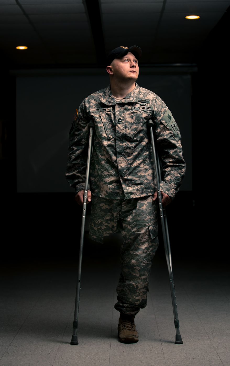 Sgt. 1st Class Josh Olson lost his right leg after being hit by an RPG in Tal Afar, Iraq, in October 2003. He's currently stationed at Fort Benning in Georgia as part of the Army's Marksmanship Unit. (Andrew S. Geraci)
