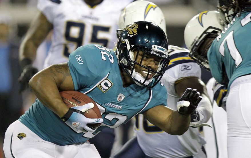 FILE - This Dec. 5, 2011 file photo shows Jacksonville Jaguars running back Maurice Jones-Drew running against the San Diego Chargers during the first half of an NFL football game, in Jacksonville, Fla. Jones-Drew&#39;s holdout appears far from over.  His agent, Adisa Bakari, told The Associated Press on Tuesday, Aug. 21, 2012, that the Jaguars running back is upset with owner Shad Khan&#39;s recent public comments about his client&#39;s 27-day holdout.  (AP Photo/John Raoux, File)