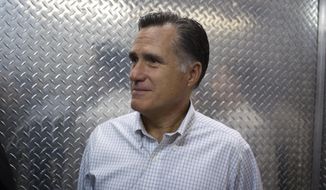 Republican presidential candidate Mitt Romney rides in an elevator to attend a fundraising event in Little Rock, Ark., on Aug. 22, 2012. (Associated Press)
