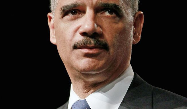 Attorney General Eric H. Holder Jr.’s use of FBI planes for travel is the subject of a letter to the FBI director from GOP lawmakers questioning whether the number and nature of his flights amount to misuse. (Associated Press)