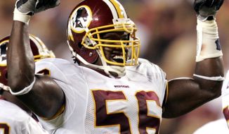 Washington Redskins linebacker LaVar Arrington flexes his muscles in the third quarter of a preseason game against the Pittsburgh Steelers on Friday, Aug. 26, 2005 in Landover, Md. This was Arrington&#39;s first game back after he missed most of last season with a knee injury. The Redskins won 17-10. (AP Photo/Evan Vucci)