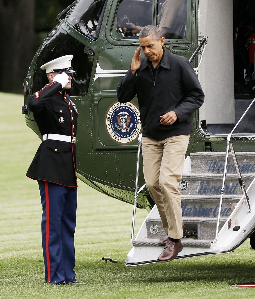 President Obama steps off the Marine One helicopter upon arrival on the South Lawn of the White House in Washington on Sunday. His convention is next week. (Associated Press)