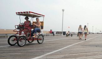 Ocean City, Md., is a major tourist draw, and it’s only a short drive for D.C. residents, who take more vacations than residents of any other large U.S. city. Responding to news that Prince Harry and wife Meghan Markle are hoping to step down from senior royal status, the town&#39;s official Twitter account tweeted on Jan. 8, 2020, that the couple are “welcome to come for a visit any time!”(Associated Press) ** FILE **