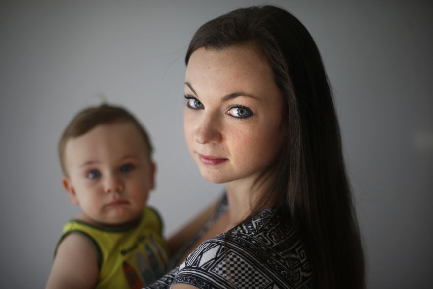 Philadelphia social worker Shannon Coyne and her husband decided against circumcision for their son, pictured here at 11 months. (AP Photo/Matt Rourke)