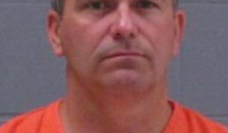 Todd Hoffner, head football coach at Minnesota State University in Mankato, Minn., has been charged with two counts related to child pornography after authorities said they found nude images of children on his cellphone. (AP Photo/Blue Earth County, Minn., Sheriff&#39;s Office)