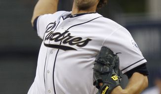 San Diego Padres pitcher Casey Kelly pitches against the Atlanta Braves during the first inning of a baseball game Monday, Aug. 27, 2012 in San Diego. (AP Photo/Lenny Ignelzi)