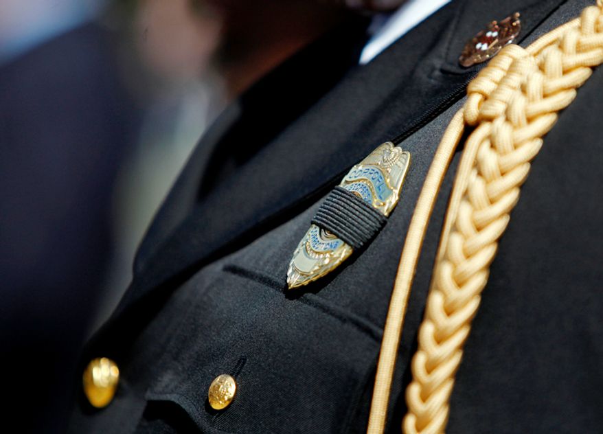 The funeral for Prince George's County police officer Adrian Morris begins at Woodstream Church in Mitchellville, MD, on August 28, 2012. Morris died in the line of duty on August 20, 2012. (Eva Russo/Special to The Washington Times)
