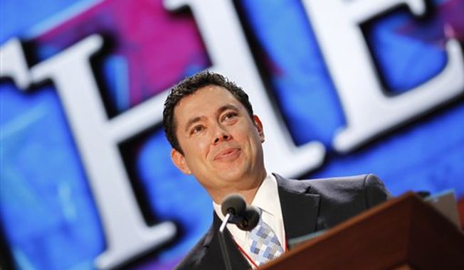 **FILE** Utah Rep. Jason Chaffetz stands on the stage Aug. 25, 2012, during preparation for the Republican National Convention festivities inside the Tampa Bay Times Forum in Tampa, Fla. (Associated Press)
