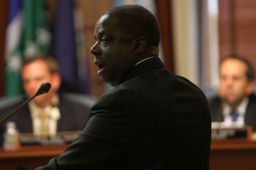 Warren Harris, Director of Economic Development authority, briefs the Virginia Beach City Council in Virginia Beach, Va., on Tuesday, Aug. 28, 2012, afternoon on the benefits to the region to bringing a professional sports team to town. (AP Photo/The Virginian-Pilot, Stephen M. Katz)