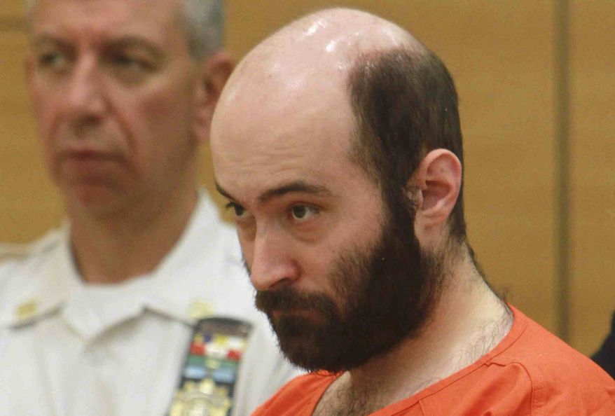 ** FILE ** In this Aug. 4, 2011, file photo, Levi Aron, accused of abducting and dismembering a Brooklyn boy, is arraigned in Brooklyn criminal court in New York. Aron is expected to be sentenced Wednesday, Aug. 29, 2012. He pleaded guilty earlier this month in the death of 8-year-old Leiby Kletzky. The 36-year-old Aron admitted killing the child after the boy asked him for directions. (AP Photo/Jesse Ward, Pool, File)