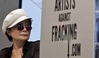 **FILE** Yoko Ono appears at a news conference to launch the coalition of artists opposing hydraulic fracturing on Wednesday, Aug. 29, 2012, in New York. (Associated Press)
