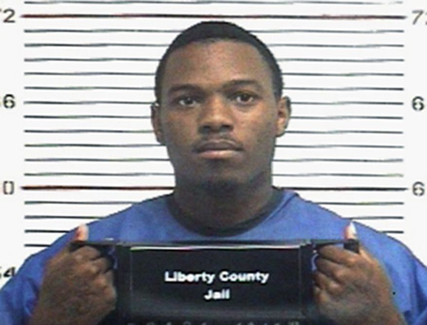 **FILE** This undated booking photo provided by the Liberty County Sheriff's Department in Liberty, Texas, shows Eric McGowen, who is charged with aggravated sexual assault of an 11-year-old girl in 2010 in Cleveland, Texas. McGowen is among 14 adults charged in the case. (Associated Press/Liberty County Sheriff's Department)