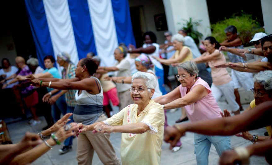 Women exercise at a senior center that provides retirees with medical attention, meals and social activities, in Havana. Cuba has the oldest citizenry in Latin America, a phenomenon fueled by low birth rates and long life expectancies, plus the migration of young people and women. The government has postponed the retirement age. (Associated Press)