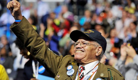 World War Two veteran and California delegate Stephen E. Sherman of Los Angeles, Calif., applauds as Cory A. Booker-D, Mayor of Newark, N.J. addresses the Democratic National Convention (Barbara Salisbury/ The Washington Times)