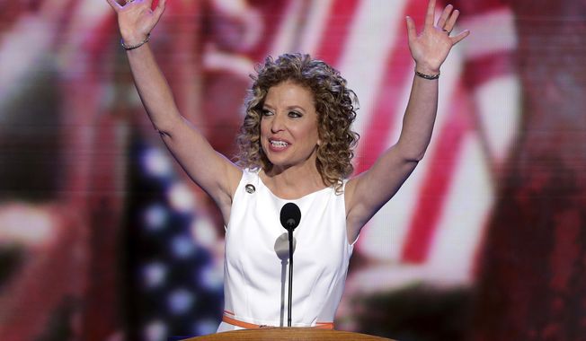 Democratic National Committee Chairwoman Rep. Debbie Wasserman Schultz of Florida waves Sept. 4, 2012, as she opens the party&#x27;s convention in Charlotte, N.C. (Associated Press)