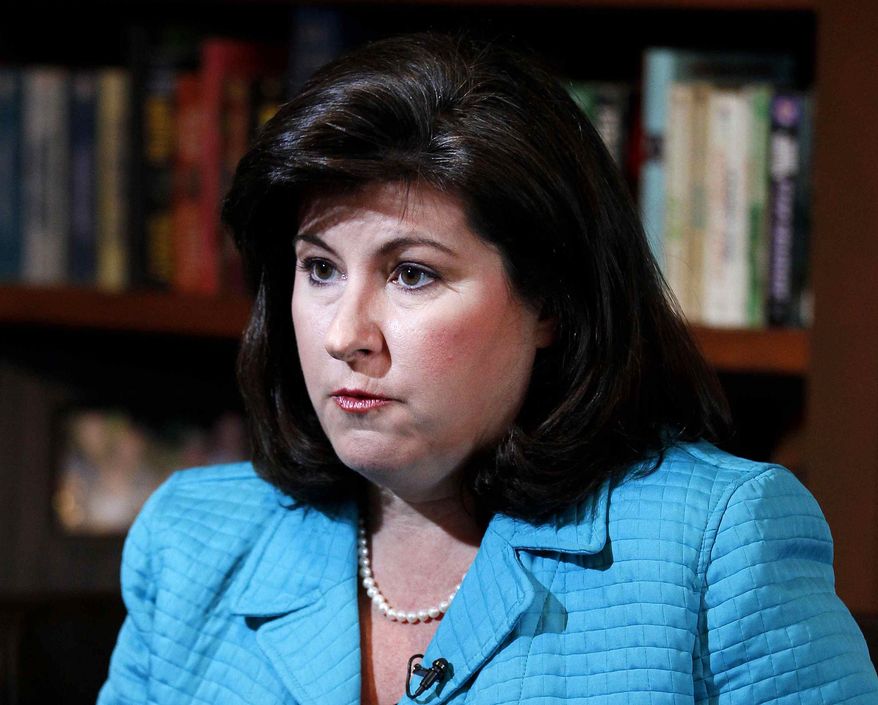 ** FILE ** This Feb. 7, 2012, file photo shows Karen Handel, former vice president for public policy for Susan G. Komen for the Cure breast-cancer charity, speaking during an interview in Atlanta. Handel, the former Susan G. Komen executive at the heart of the organization's clash with Planned Parenthood, has a book deal. (AP Photo/John Bazemore, file)