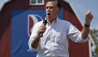 **FILE** Republican presidential candidate Mitt Romney speaks Aug. 24, 2012, during a campaign rally with running mate Rep. Paul Ryan (not shown), Wisconsin Republican, in Commerce, Mich. (Associated Press)

