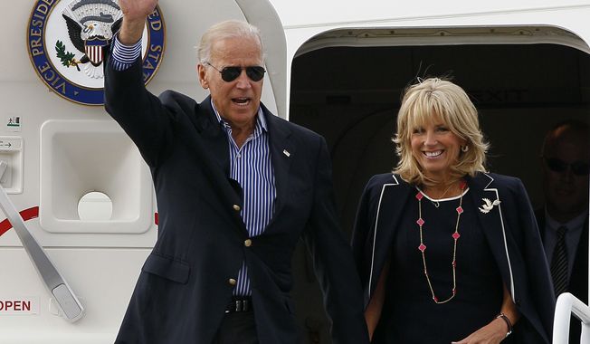 ** FILE ** Vice President Joseph R. Biden and his wife, Jill, arrive in Charlotte, N.C., on Sept. 4, 2012, to attend the Democratic National Convention. (Associated Press)
