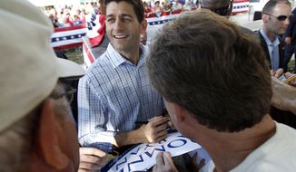 Rep. Paul Ryan, the Republican vice presidential candidate, greets supporters during a campaign event at the Dallas County Courthouse in Adel, Iowa, on Wednesday, Sept. 5, 2012. (AP Photo/Mary Altaffer)