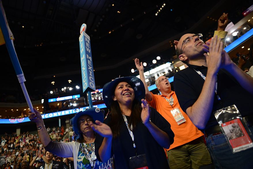 New Mexico delegate Maria Rudolfo, of Farmington, N.M., cheers an address the Democratic National Convention at the Time Warner Arena in Charlotte, N.C., on Wednesday, September 5, 2012. (Andrew Geraci/ The Washington Times)