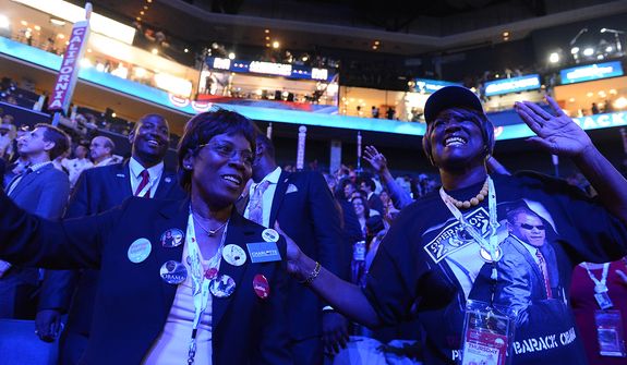 California delegates Dorothy Williams, of San Jose, Calif., left, and Rosa Russell, of Los Angeles, Calif. dance to the music of James Taylor on the night that President Barack Obama accepts his party&#39;s nomination for a second term as President of the United States at the Democratic National Convention in the Time Warner Arena in Charlotte, N.C., on Thursday, September 6, 2012. (Barbara Salisbury/ The Washington Times)