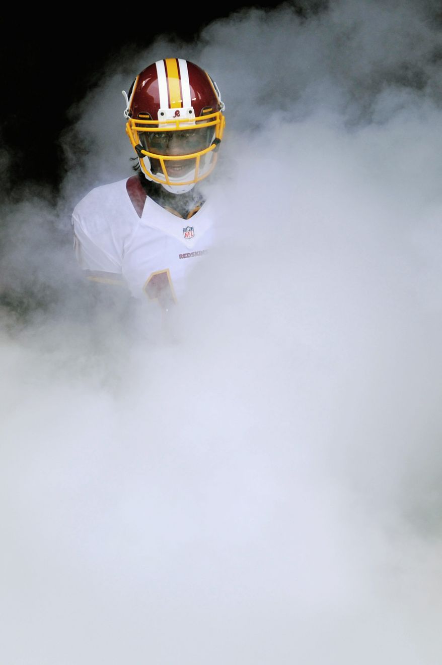 Washington Redskins quarterback Robert Griffin III (10) is introduced before his first game at FedEx Field, Landover, Md. Aug. 25, 2012. (Preston Keres/Special to The Washington Times)