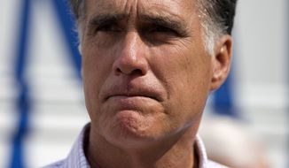 Republican presidential candidate Mitt Romney speaks Sept. 6, 2012, with reporters after making a stop at the &quot;New Hampshire Veterans and Military Families for Mitt&quot; event in Concord, N.H. (Associated Press)