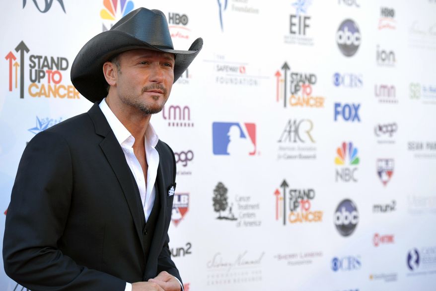 Musician Tim McGraw attends the "Stand Up to Cancer" event at the Shrine Auditorium on Friday, Sept. 7, 2012, in Los Angeles. The initiative aimed to raise funds to accelerate innovative cancer research by bringing new therapies to patients quickly. (Photo by John Shearer/Invision/AP)