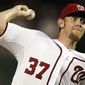 Washington Nationals starting pitcher Stephen Strasburg throws during the second inning of a baseball game against the Miami Marlins at Nationals Park, Friday, Sept. 7, 2012, in Washington. (AP Photo/Alex Brandon)