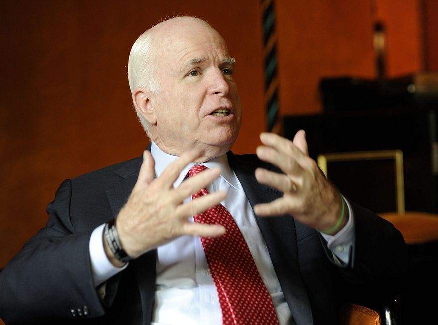 Sen. John McCain says he is disappointed that both presidential candidates are sidestepping world affairs and blasts President Obama for not aiding rebels in Syria and abandoning Iraq and Afghanistan. (Associated Press)