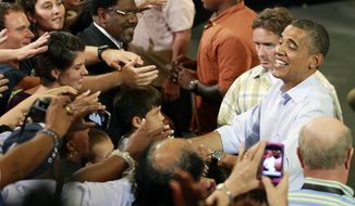 President Obama greets supporters at a campaign event on Sunday, Sept. 9, 2012, in Melbourne, Fla. (AP Photo/John Raoux)