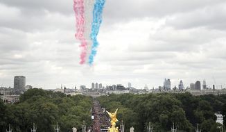 ASSOCIATED PRESS

Royal Air Force Red Arrows soar over the Mall and Buckingham Palace during a parade celebrating Britain’s Olympic and Paralympic athletes. Thousands of people waving British flags lined the streets of London on Monday to toast the athletes behind the country’s unprecedented summer of sporting success.