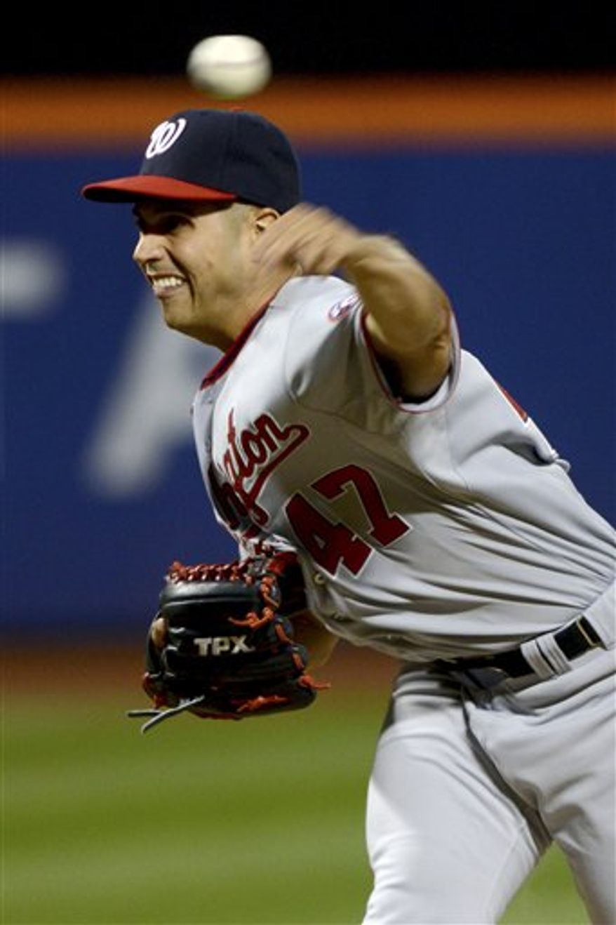 Washington Nationals' Gio Gonzalez pitches to the New York Mets in the first inning of a baseball game at Citi Field in New York, Monday, Sept. 10, 2012. Washington won the game 5-1. (AP Photo/Henny Ray Abrams)