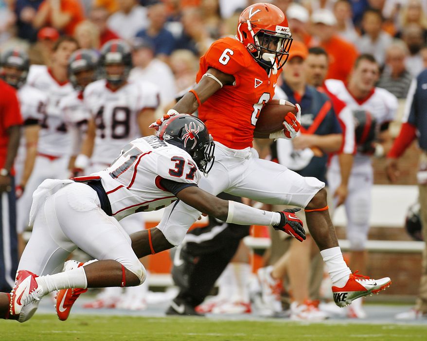 Virginia's Darius Jennings (6) runs for a touchdown past Richmond's Reggie Barnette (37) after a first quarter reception during an NCAA college football game, Saturday, Sept. 1, 2012, in Charlottesville, Va. Virginia won 43-19. (AP Photo/Richmond Times-Dispatch, Mark Gormus)