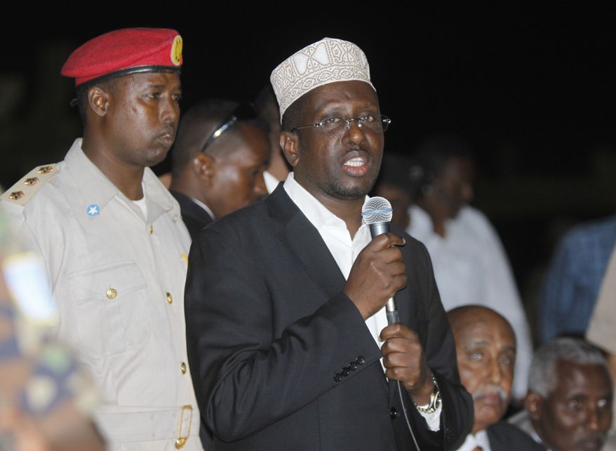 ** FILE ** Somali President Sharif Sheik Ahmed speaks during the swearing-in ceremony of 211 members of Parliament at the Aden Ade International Airport in Mogadishu, Somalia, on Monday, Aug. 20, 2012. Mr. Ahmed lost a parliamentary election for president to Hassan Sheikh Mohamud, a professor, on Monday, Sept. 10, 2012. (AP Photo/Farah Abdi Warsamehmeh)
