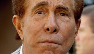 **FILE** Casino mogul Steve Wynn arrives Sept. 7, 2012, at court in Los Angeles for his slander trial against “Girls Gone Wild” founder Joe Francis, who claimed Wynn threatened to kill him over a gambling debt and bury him in the desert. (Associated Press)