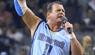FILE - This April 23, 2011 file photo shows professional wrestler Jerry Lawler gesturing to fans before the start of Game 3 of a first-round NBA basketball series between the Memphis Grizzlies and the San Antonio Spurs, in Memphis, Tenn. Lawler collapsed during a World Wrestling Entertainment event on Monday night, Sept. 10, 2012 in Montreal. A statement from the WWE said that Lawler suffered a heart attack at the announcers&#39; table and was taken from the Bell Centre to a hospital. (AP Photo/Mark Humphrey, File)