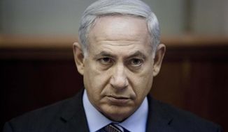 Israeli Prime Minister Benjamin Netanyahu chairs the weekly Cabinet meeting at the prime minister&#39;s office in Jerusalem on Sunday, Aug. 12, 2012. (AP Photo/Abir Sultan, Pool)