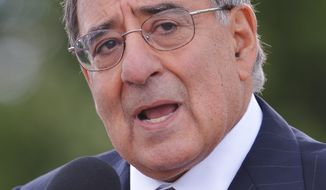 ** FILE ** Defense Secretary Leon Panetta speaks to reporters in Shanksville, Pa., on Sept. 10, 2012, after visiting the Flight 93 National Memorial ahead of the 11th anniversary of the 9/11 attacks. (Associated Press)